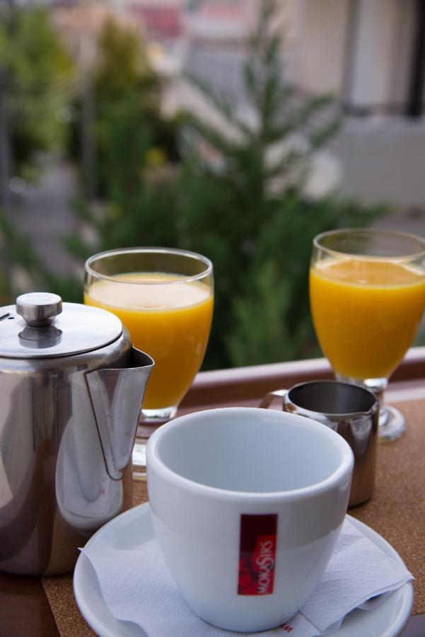 Hotel Maroussi Athena Bagian luar foto